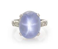 An Art Deco Platinum, Star Sapphire and Diamond Ring, 4.70 dwts.