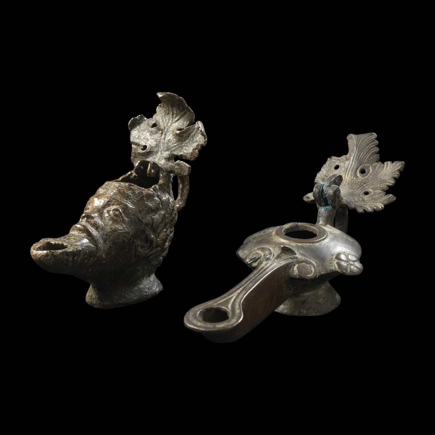 Two Roman Bronze Oil Lamps