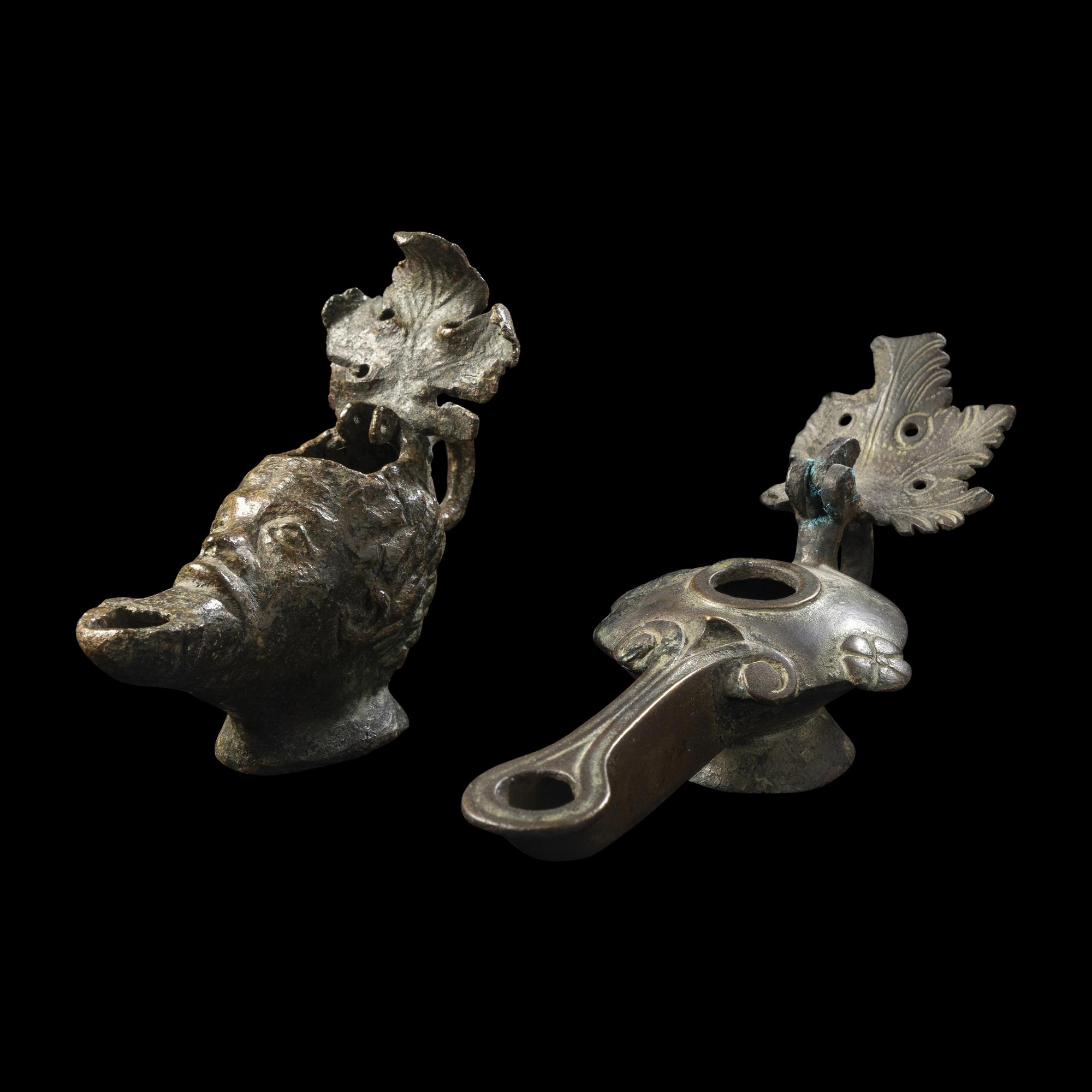 Two Roman Bronze Oil Lamps