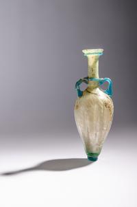 A Roman Glass Flask with Silver Iridescence