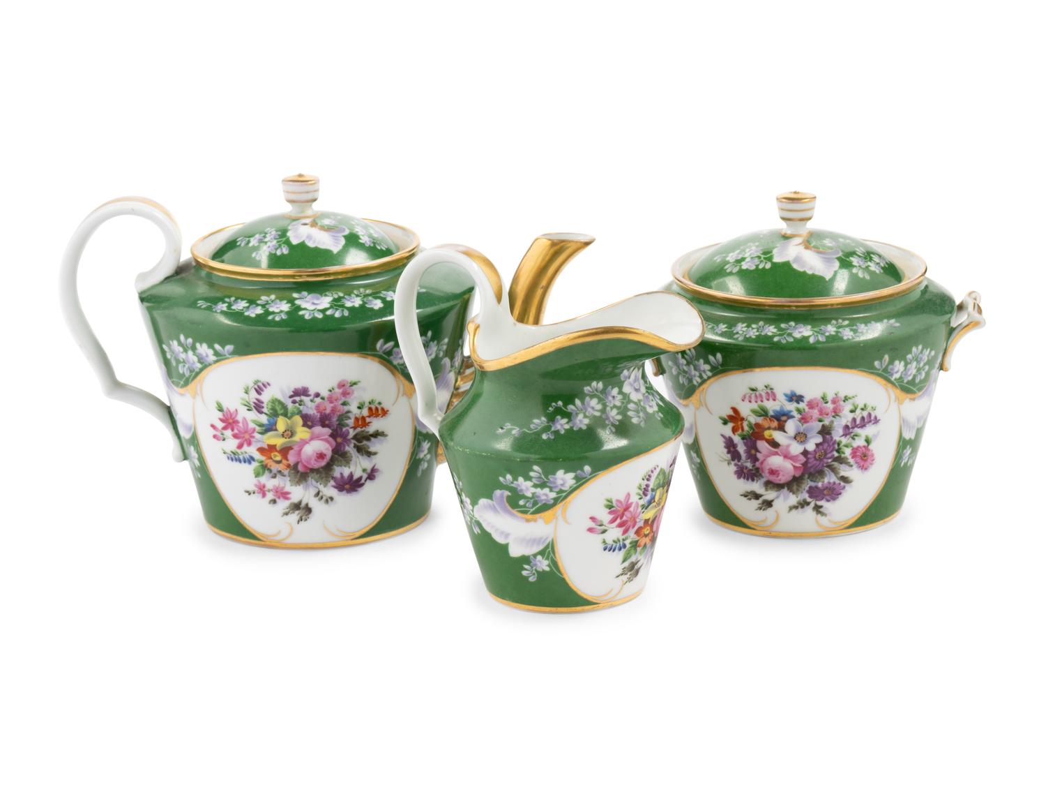 A Popov Porcelain Three-Piece Tea Service
