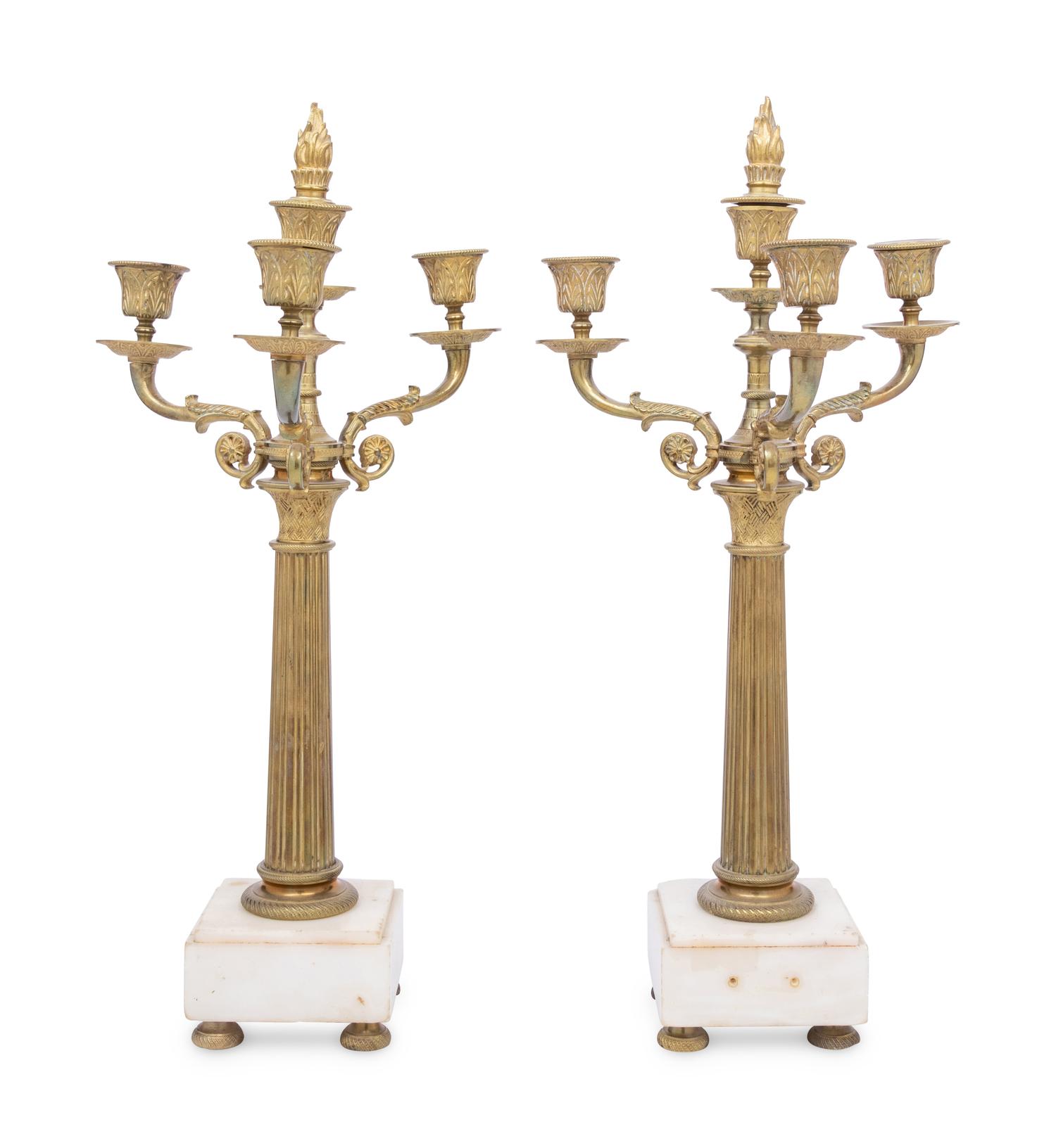 A Pair of Continental Gilt Bronze and Marble Three-Light Candelabra