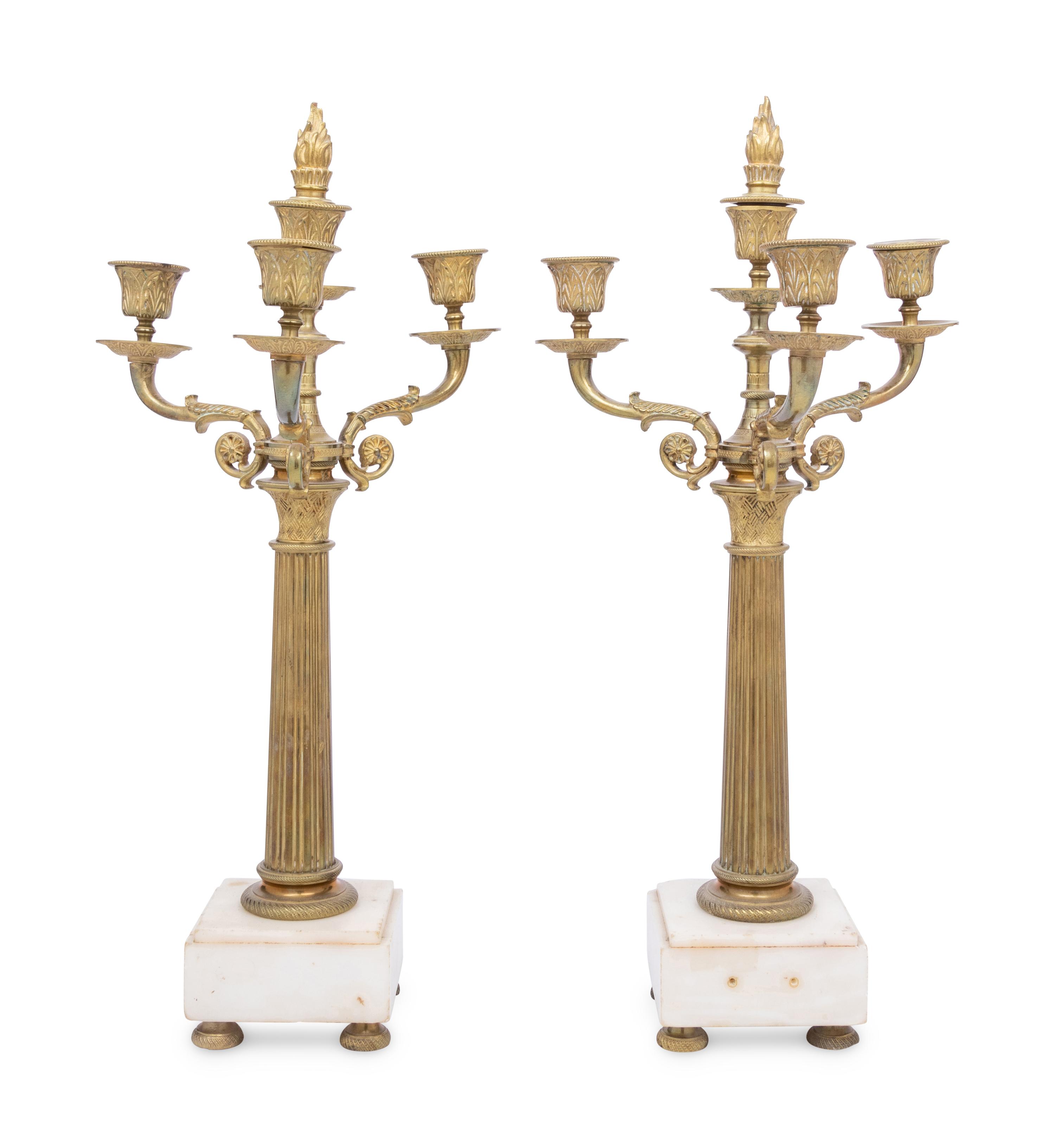A Pair of Continental Gilt Bronze and Marble Three-Light Candelabra