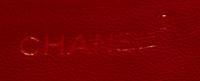 A Chanel Red Leather Quilted Flap Bag, 9" x 7" x 2".