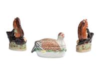 A Pair of Staffordshire Squirrel Figures