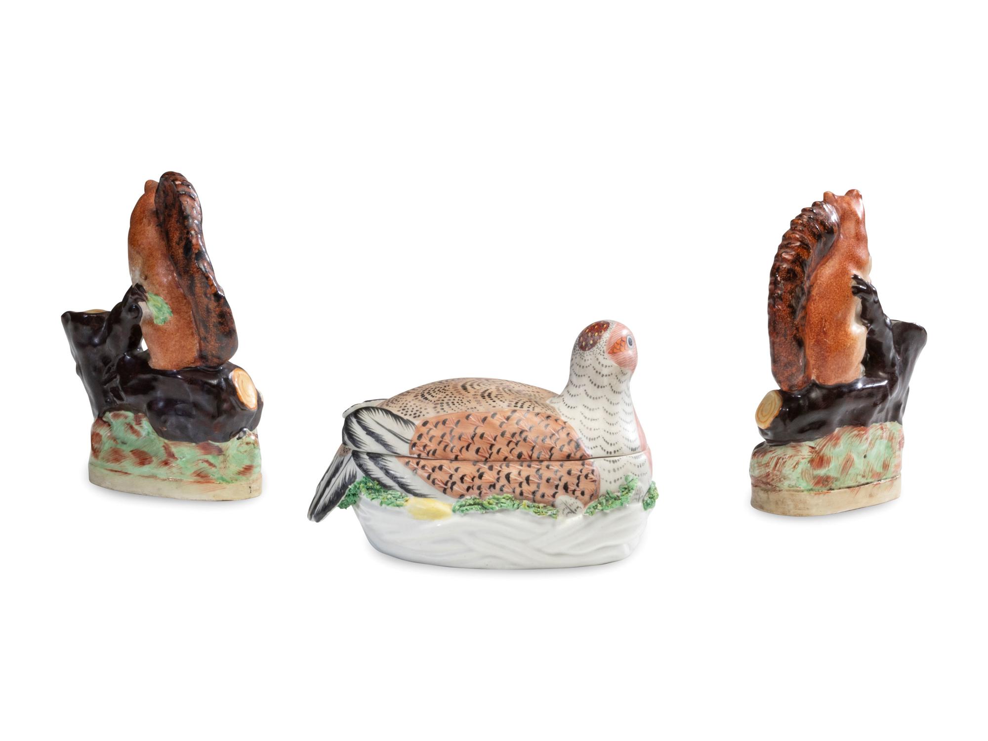 A Pair of Staffordshire Squirrel Figures