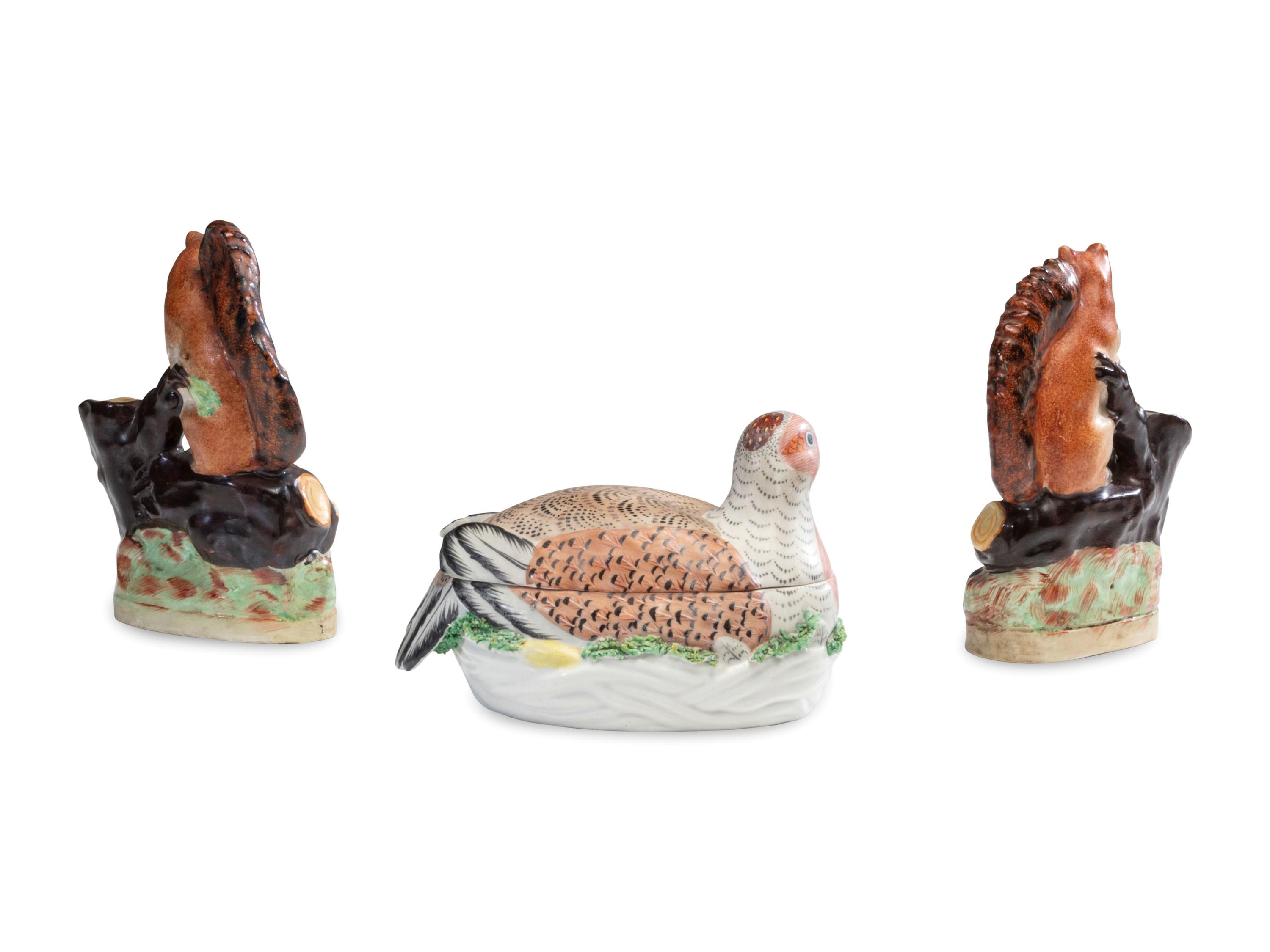 A Pair of Staffordshire Squirrel Figures