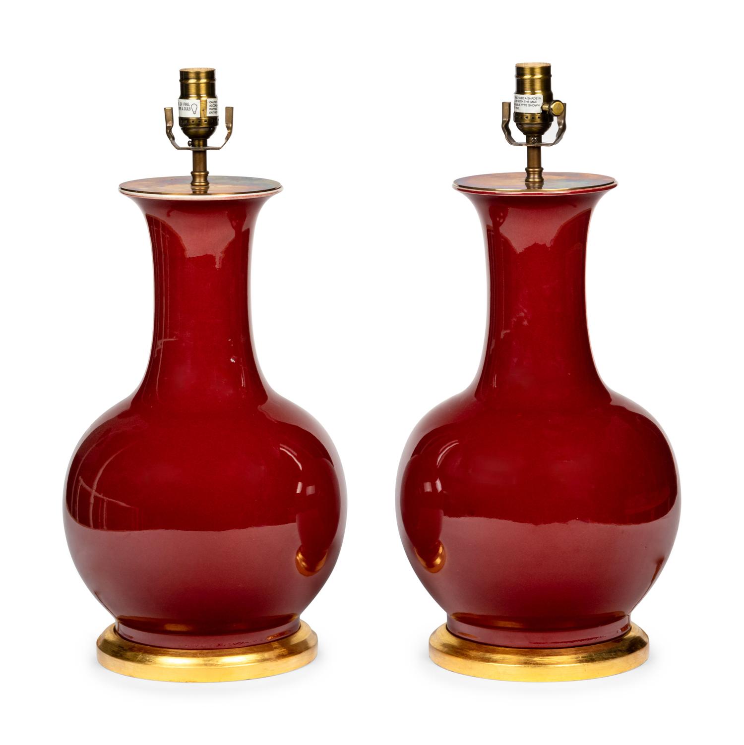 A Pair of Iron Red Glazed Porcelain Lamps