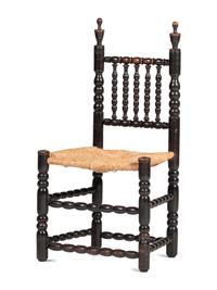 A Rare Pilgrim Century Black Painted Sausage-Turned Rush-Seat Side Chair