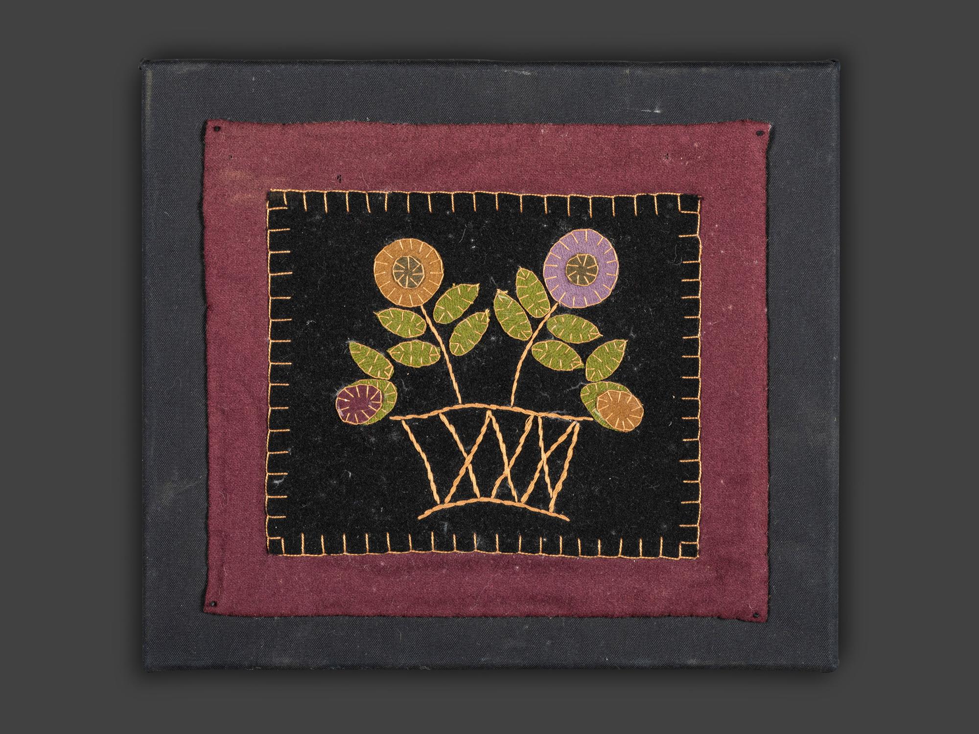 An American Embroidered Feltwork Floral Basket Panel