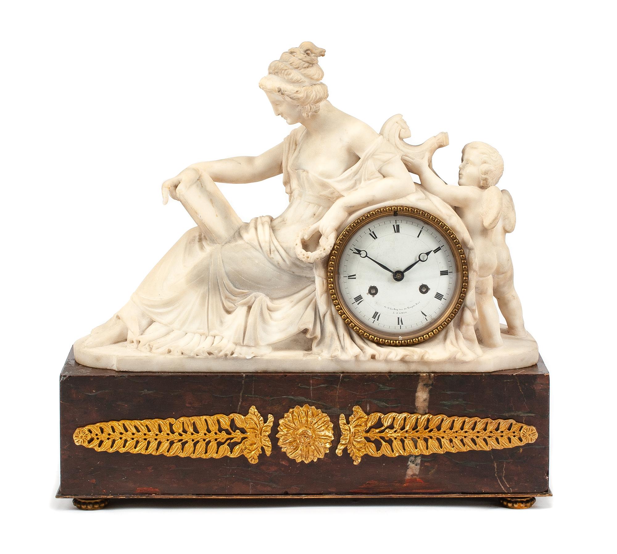 An Empire Style Gilt Bronze Mounted Marble Mantel Clock Width 18 inches. — 19TH CENTURY