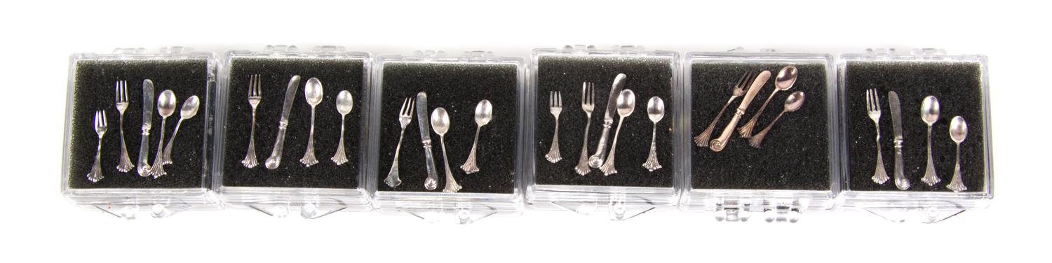 An American Silver Flatware Service, Attributed to Obadiah Fisher, New York, NY, English Onslow pattern, comprising: 6 dinner knives 6