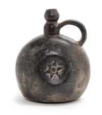 A Polished Black Earthenware Water Vessel Height 8 x width 6 1/4 x depth 4 1/2 inches.
