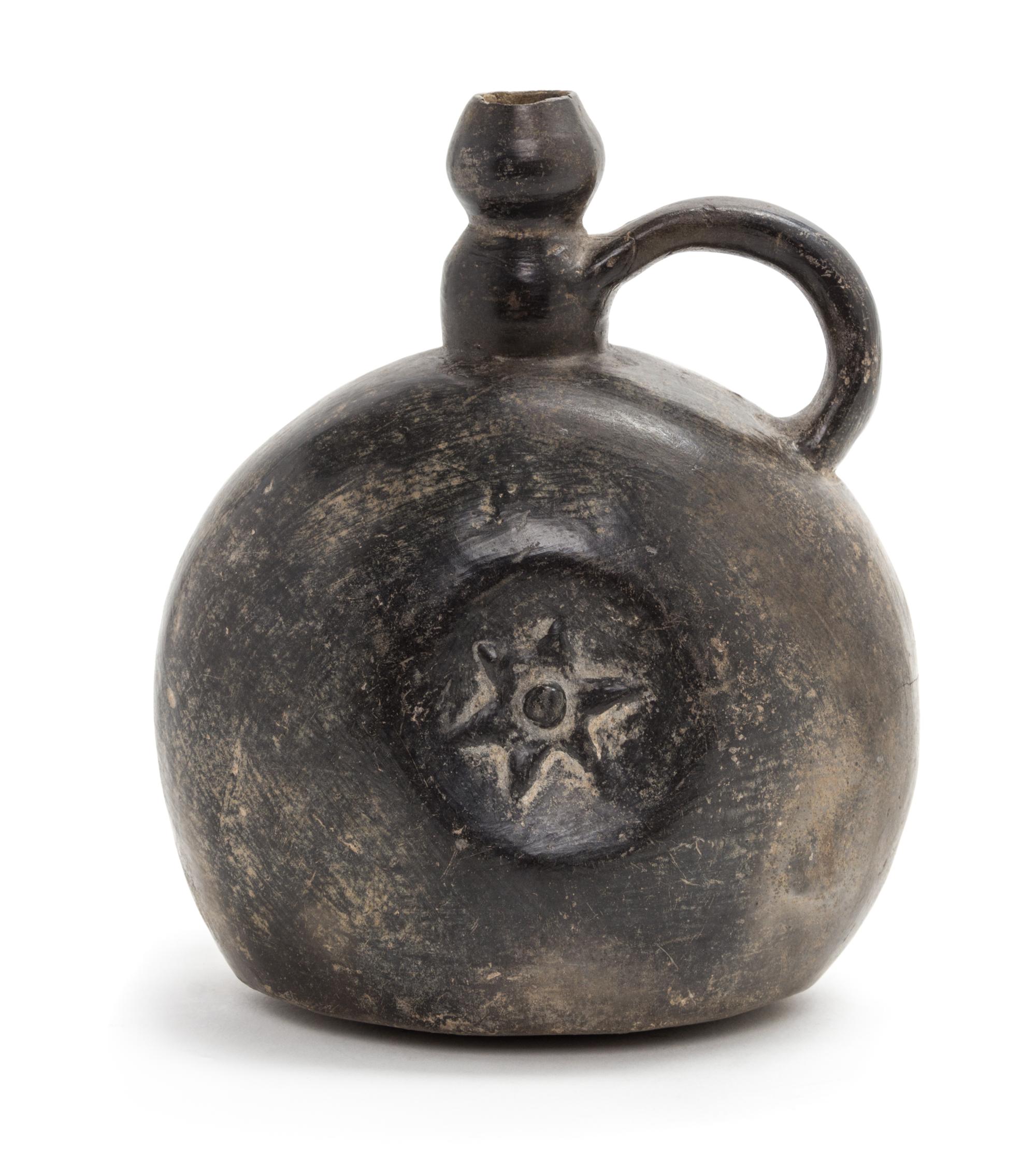 A Polished Black Earthenware Water Vessel Height 8 x width 6 1/4 x depth 4 1/2 inches.