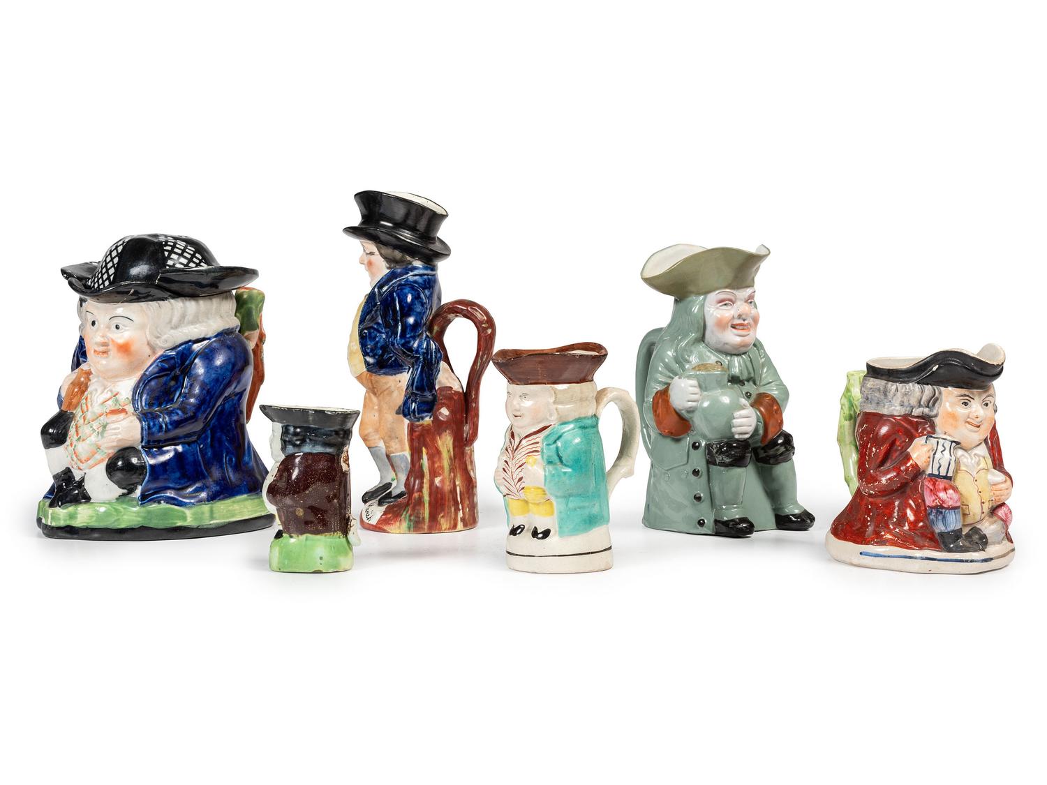 Six Miniature Staffordshire Toby Jugs