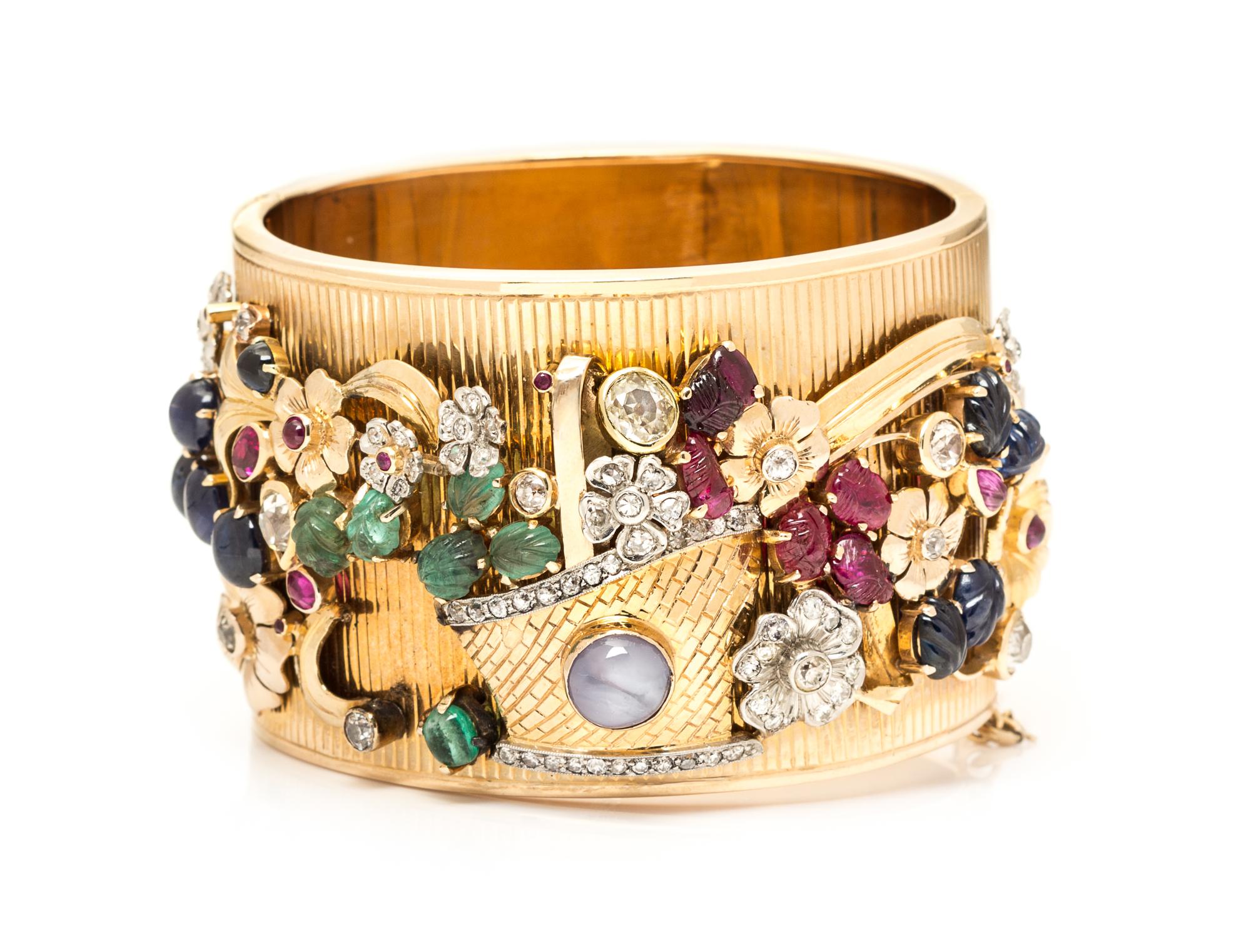 A Retro Rose Gold Bangle with Diamond and Multigem Flower Basket Motif Overlay, Circa 1940, 53.10 dwts.
