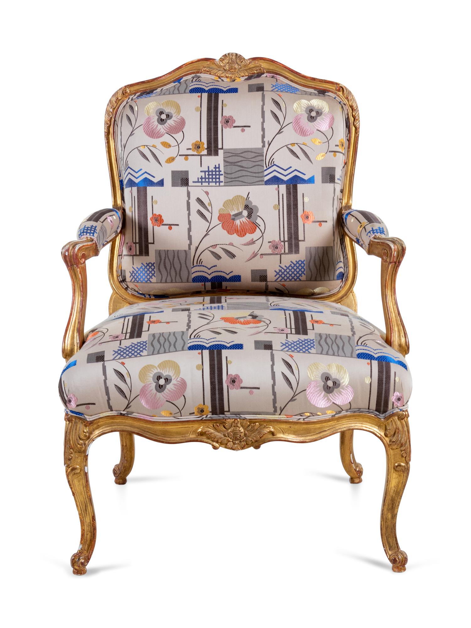 A Louis XV Style Carved Giltwood Fauteuil
