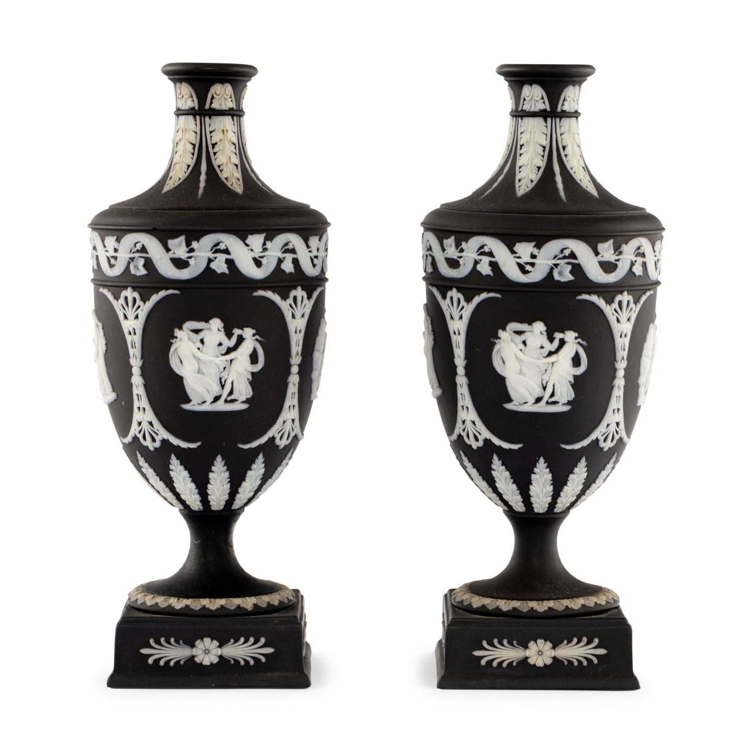 A Pair of Wedgwood Black Jasperware Urns