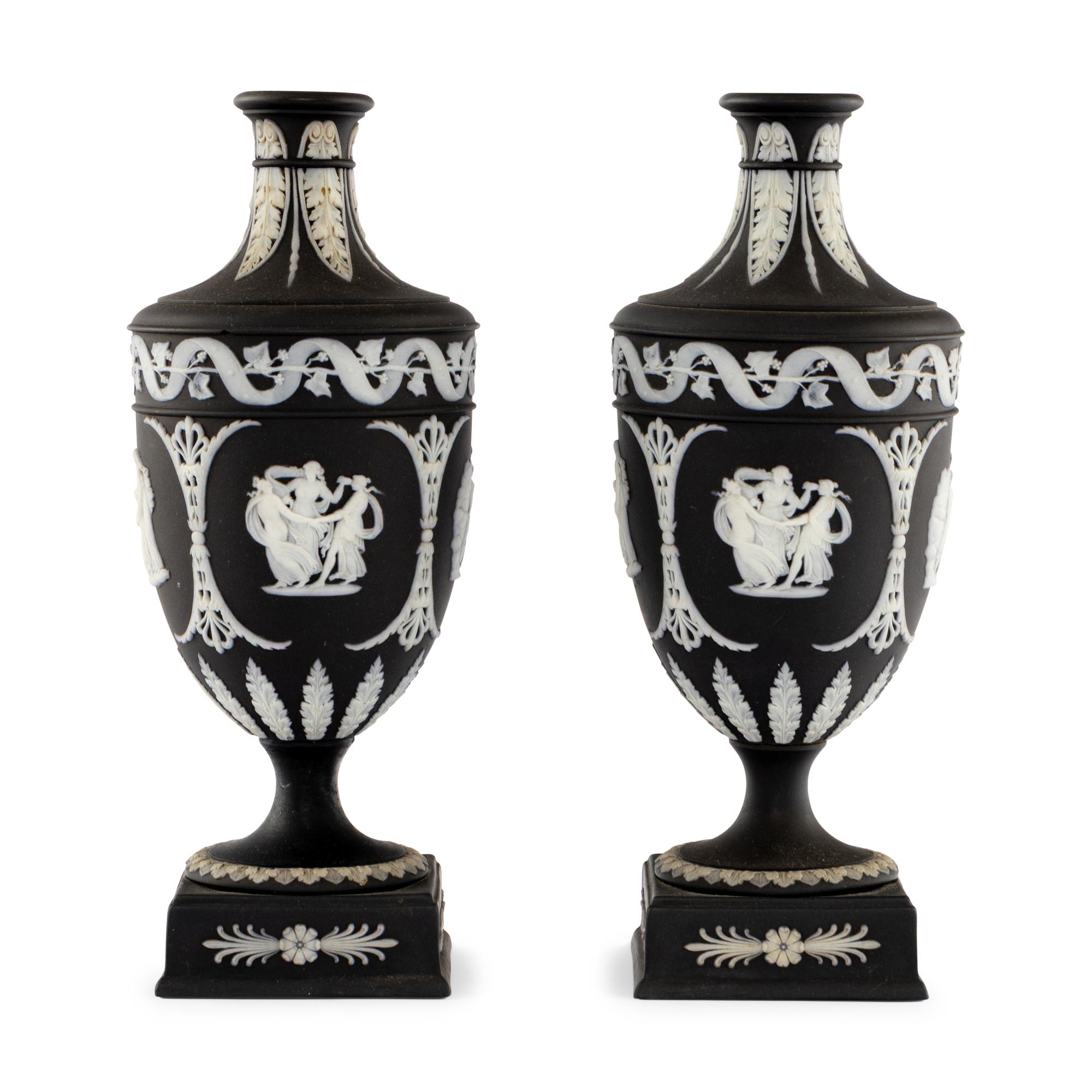 A Pair of Wedgwood Black Jasperware Urns
