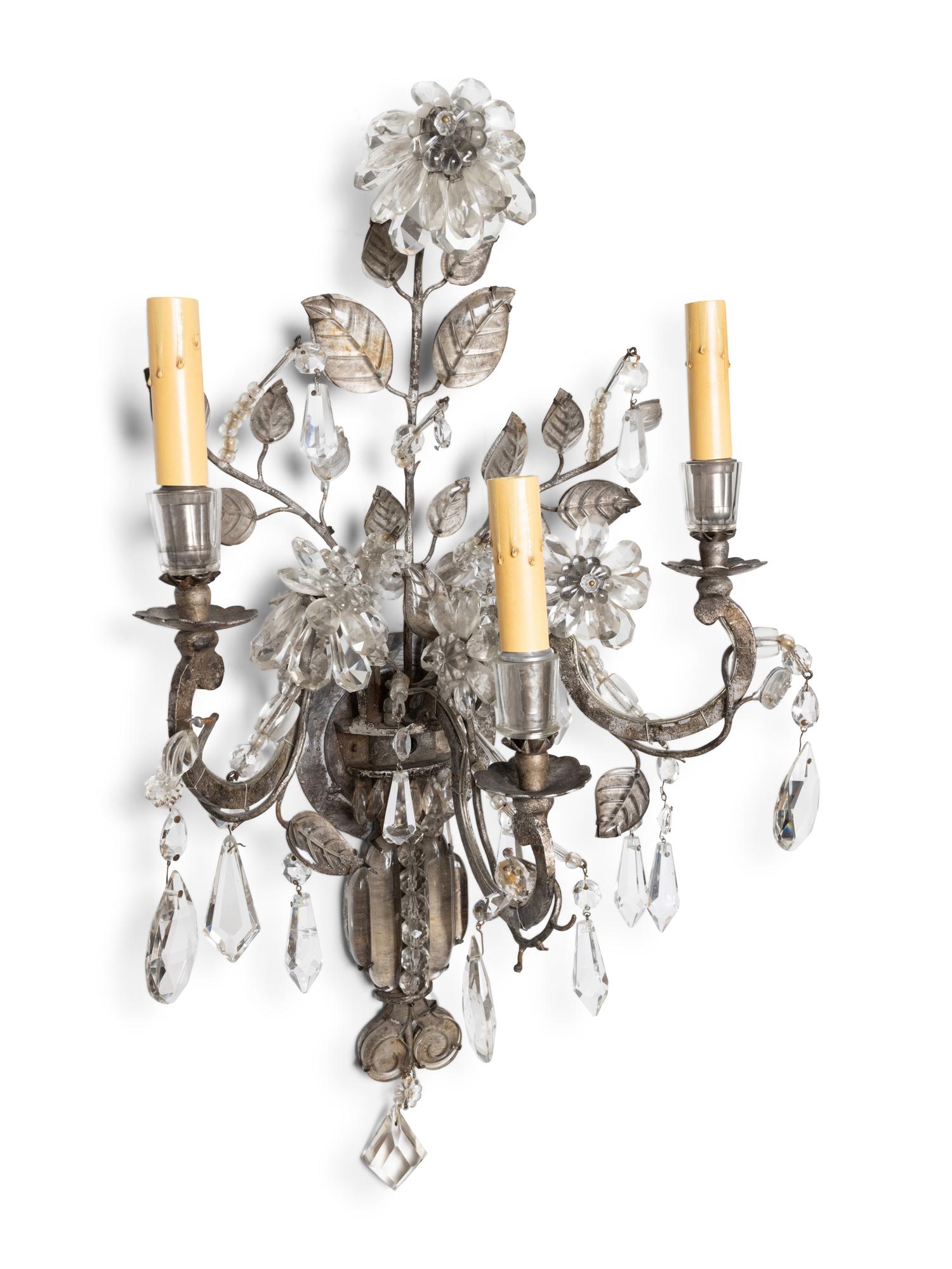 A Pair of Silvered Metal and Glass Three-Light Sconces in the Style of Maison Baguès