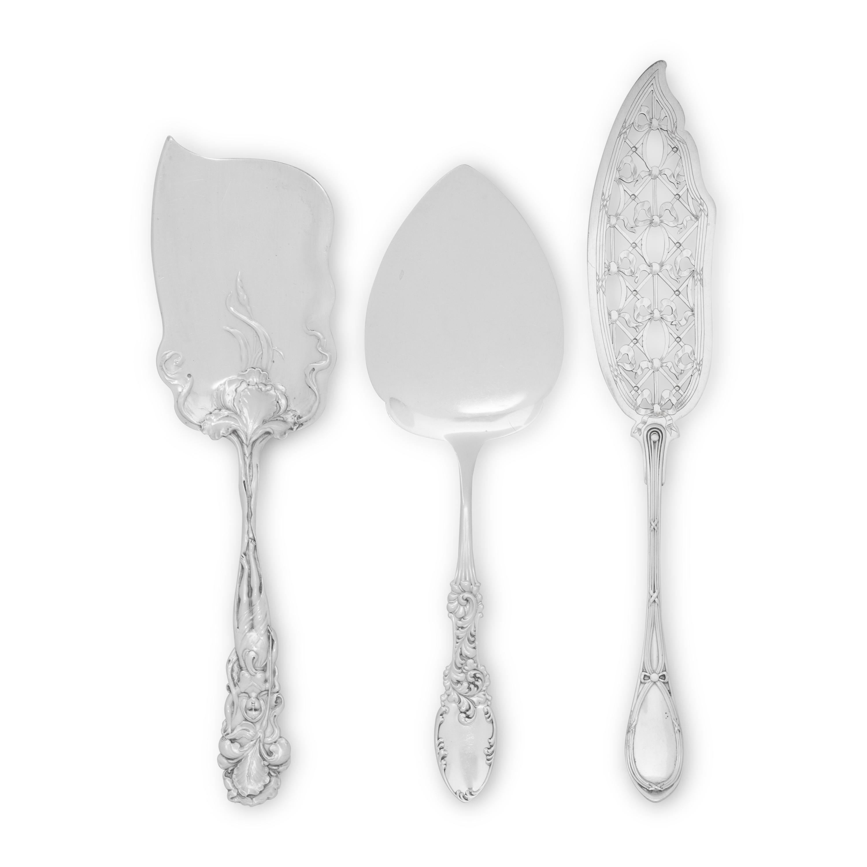 A Collection of Silver Flatware Serving Articles