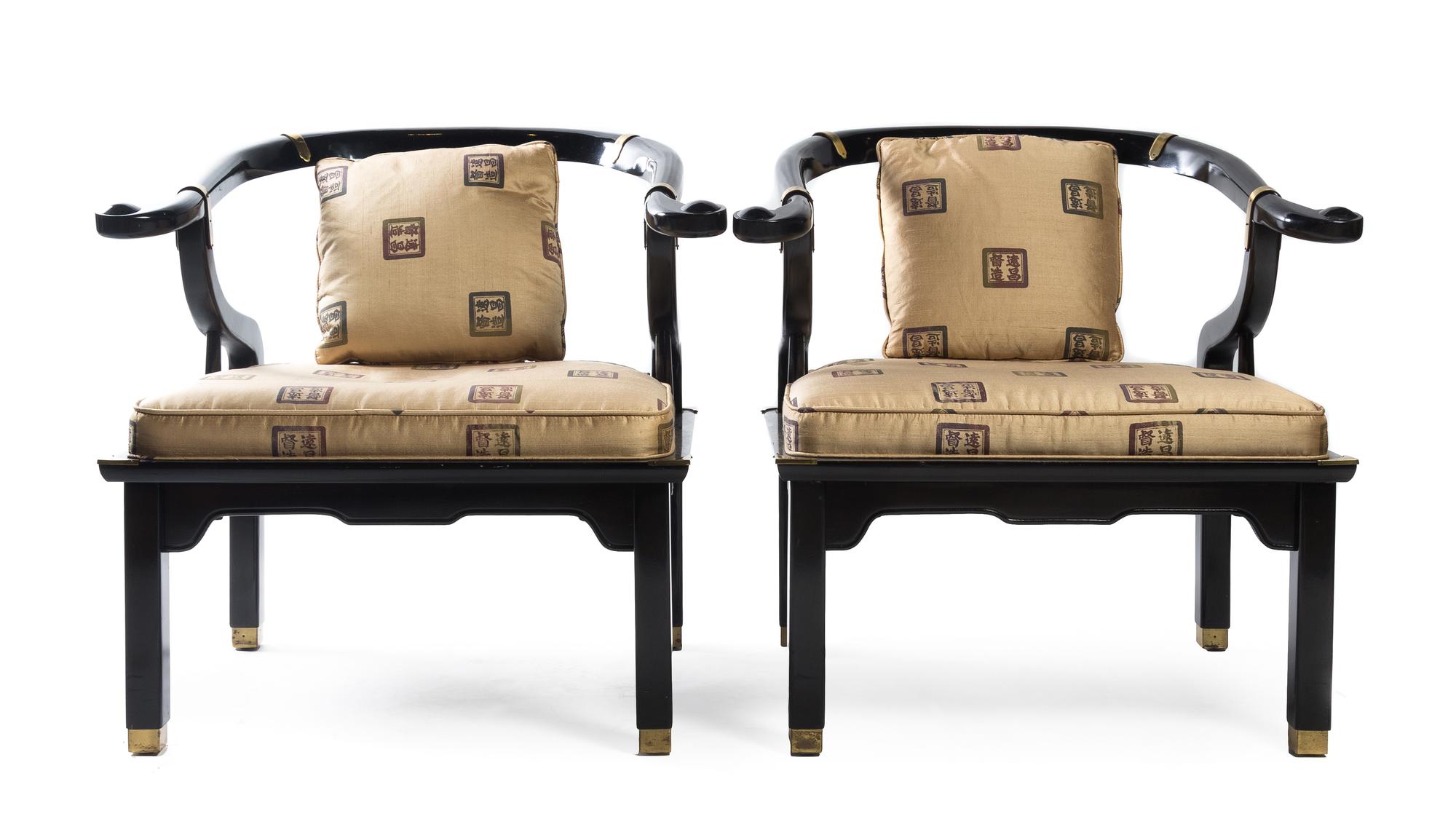 Manner of James Mont, SECOND HALF 20TH CENTURY, a pair of yoke back armchairs with brass mounts.