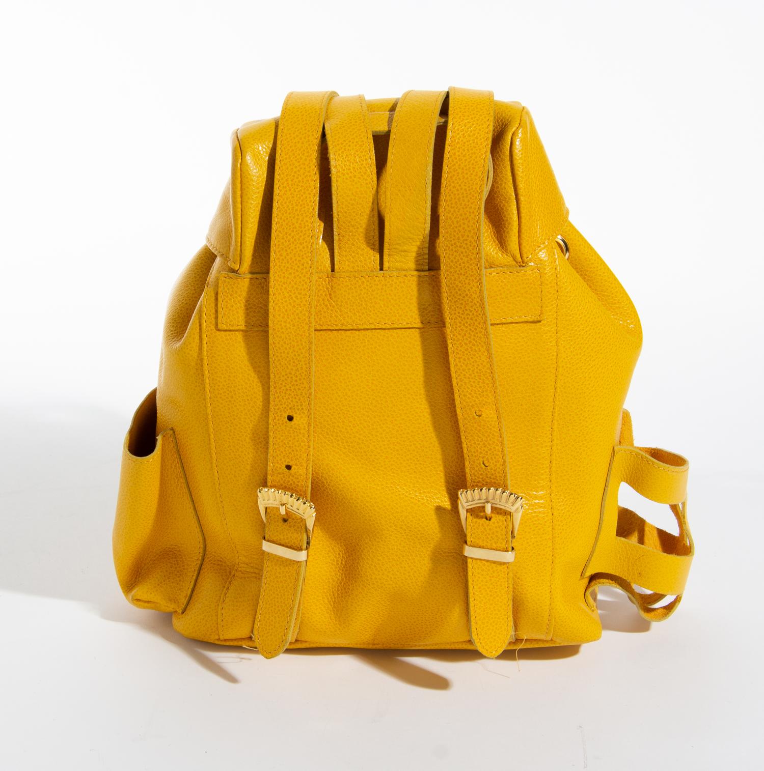 A Gianni Versace Yellow Leather Small Backpack, 9" x 8" x 3".