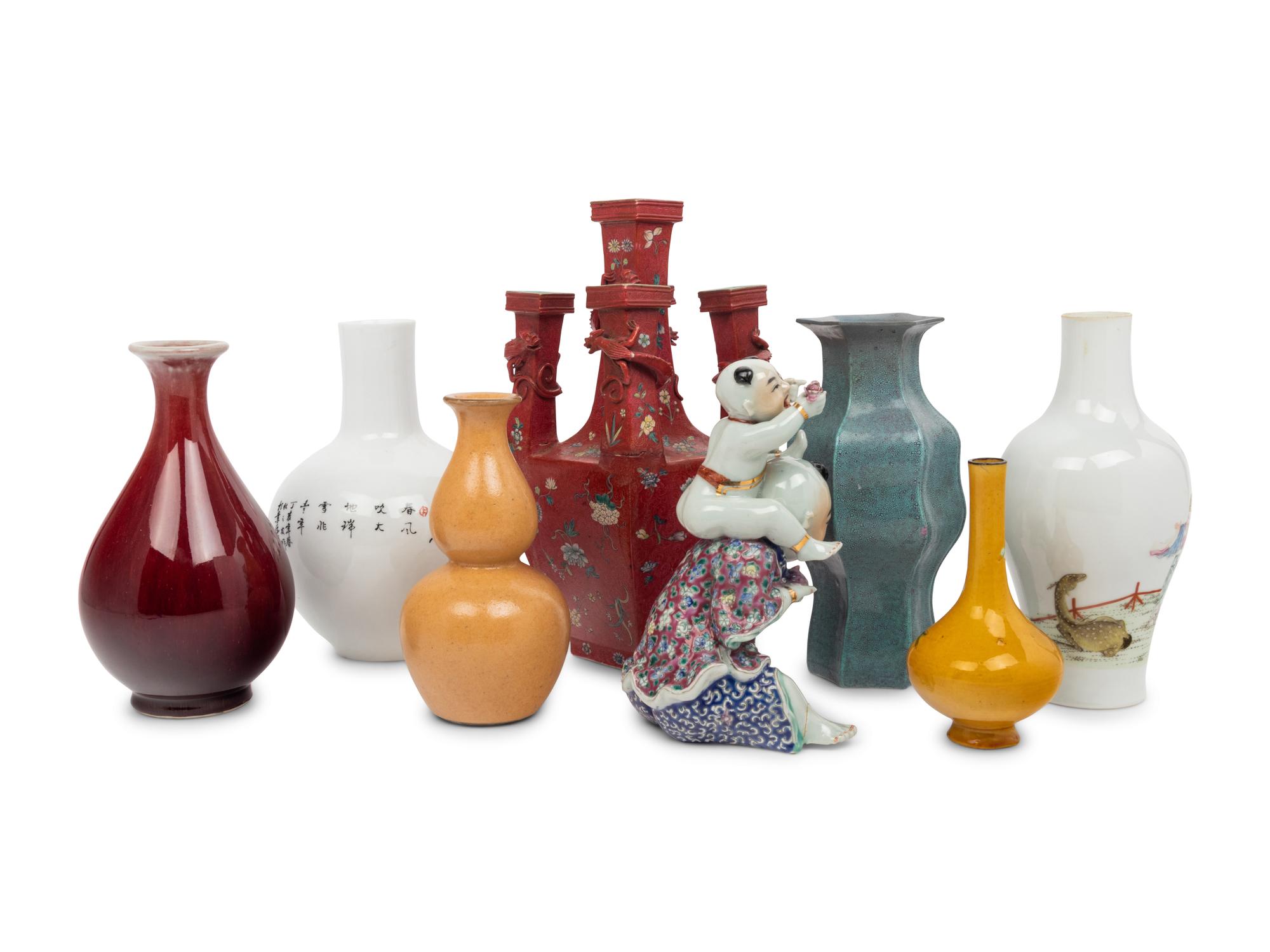 Seven Chinese Porcelain Vases and A Chinese Famille Rose Porcelain Figures