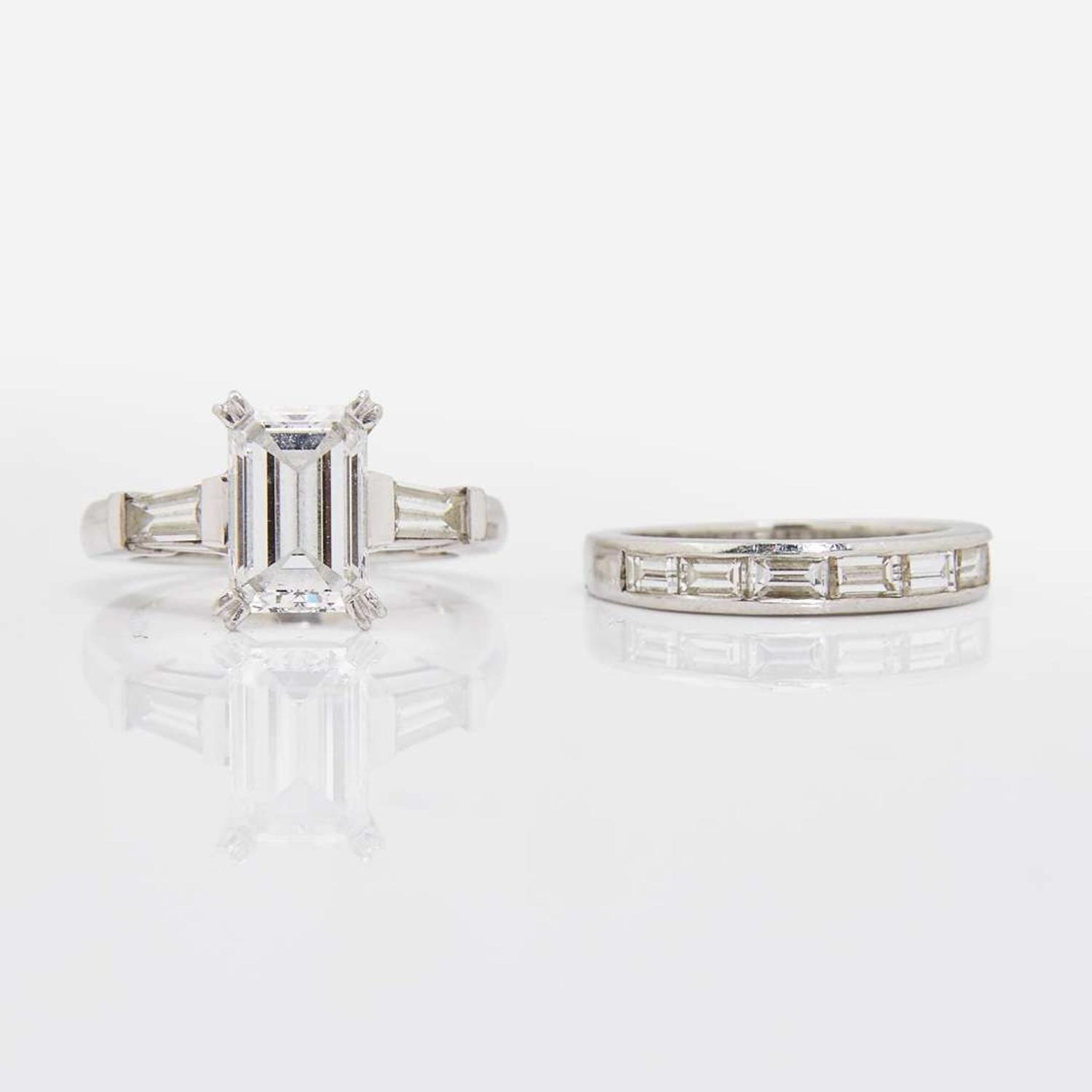 An Emerald-Cut Diamond and Platinum Ring and Band 2.25 Carat Emerald-Cut Diamond, GIA Certified