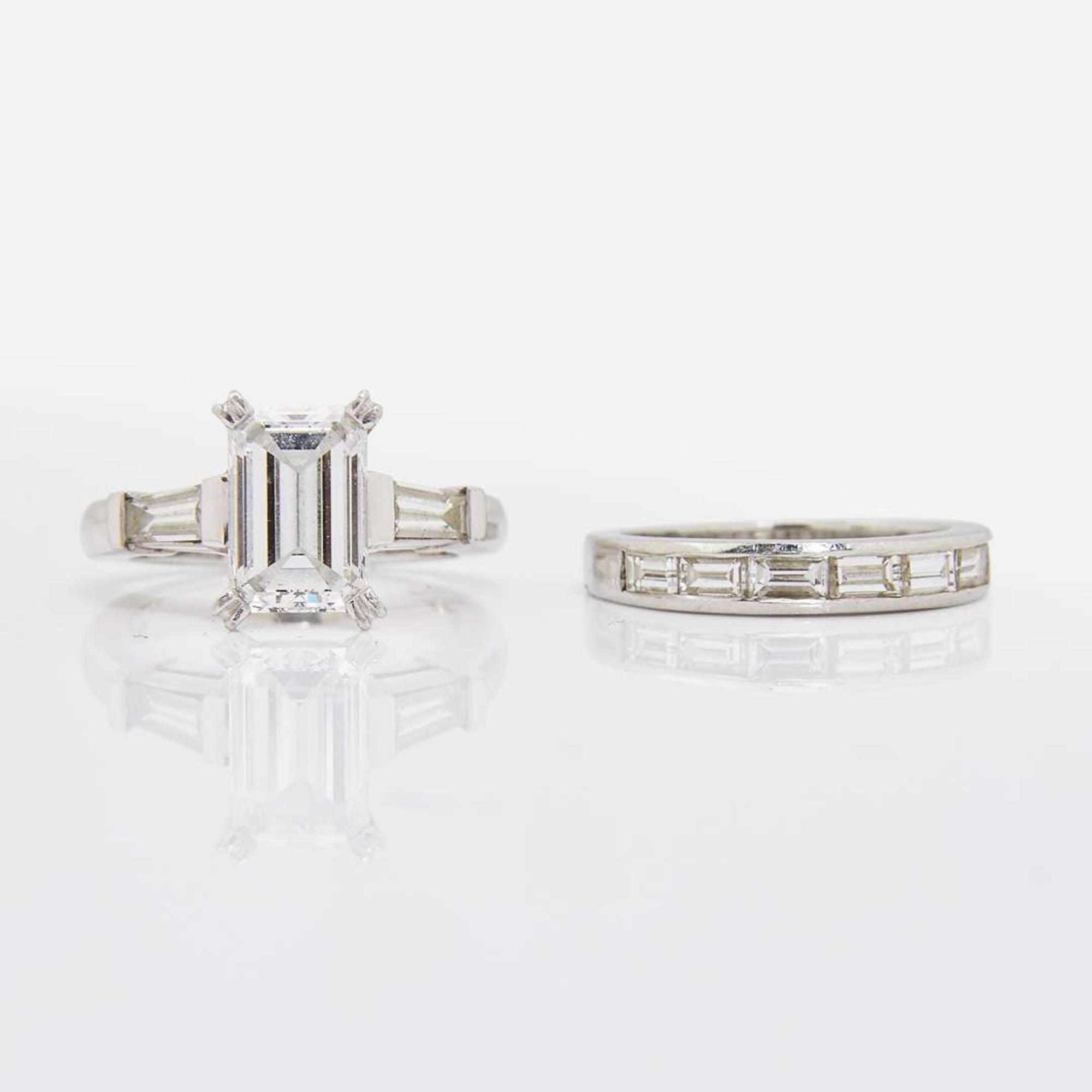 An Emerald-Cut Diamond and Platinum Ring and Band 2.25 Carat Emerald-Cut Diamond, GIA Certified