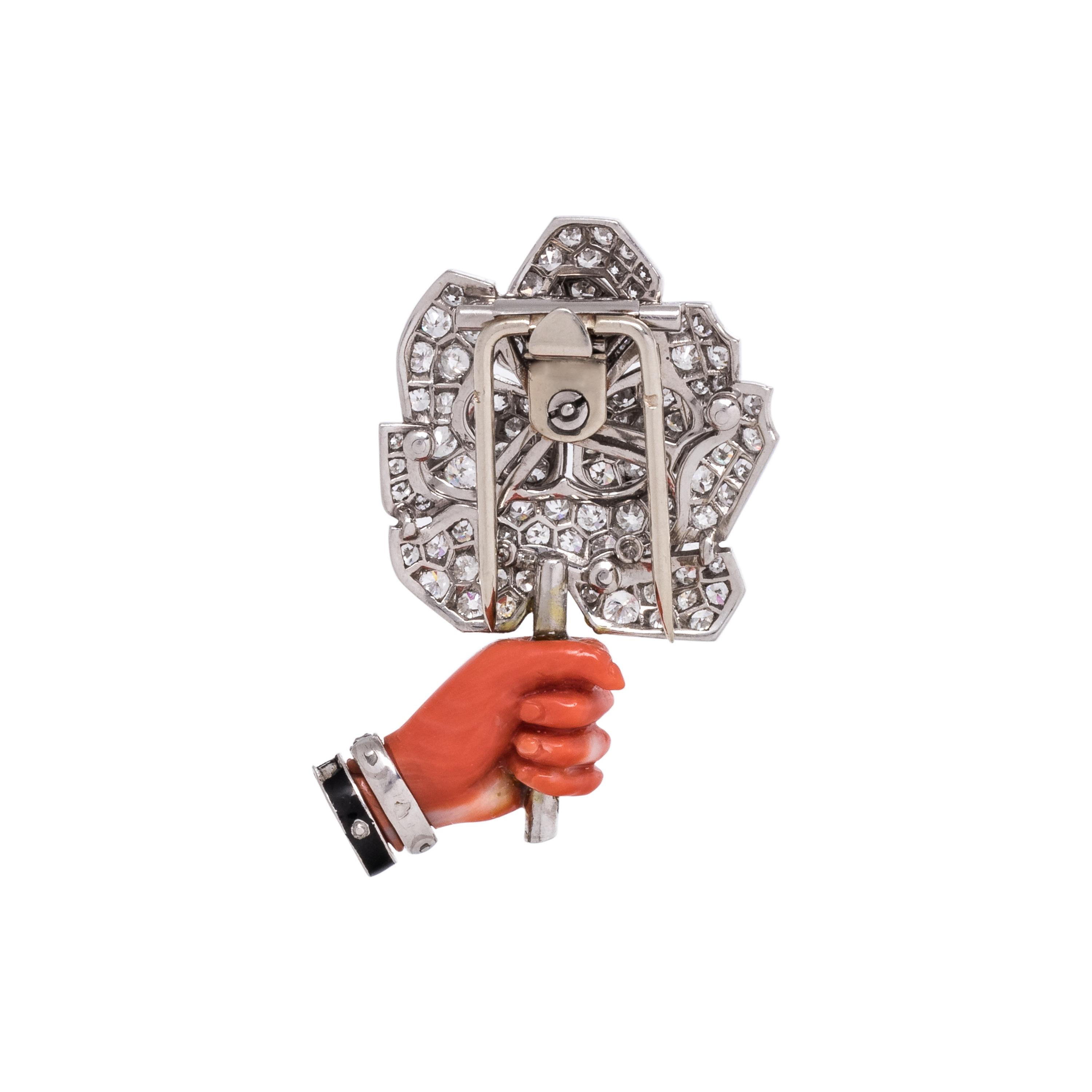 CARTIER, ART DECO, CORAL AND DIAMOND 'FLOWER IN HAND' BROOCH
