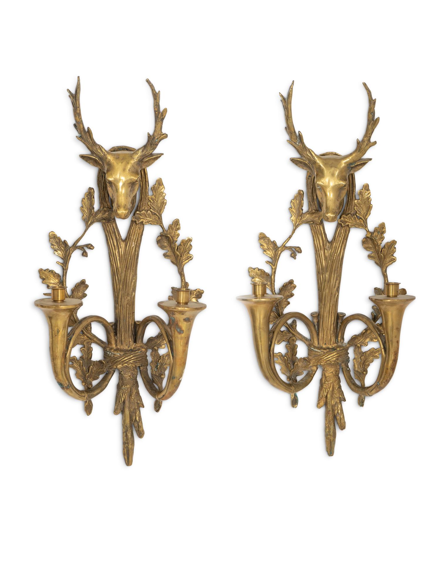 A Pair of English Brass Stag Head and Hunting Horn Sconces