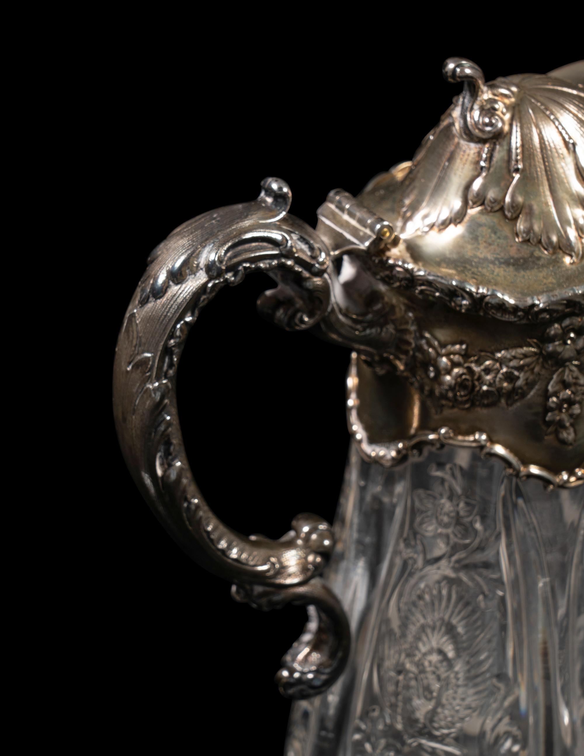 An American Silver Mounted Cut Glass Claret Jug