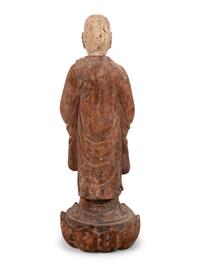 A Chinese Carved and Polychrome Decorated Wood Figure in Prayer