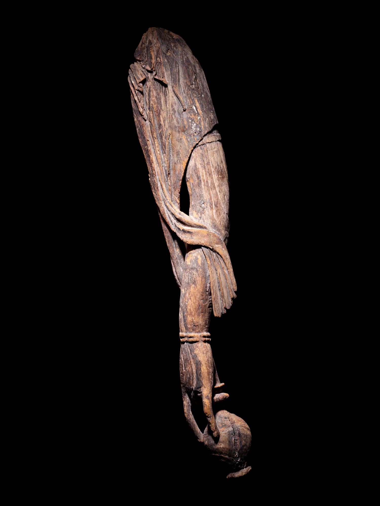 A Carved Wood Arm of Guanyin