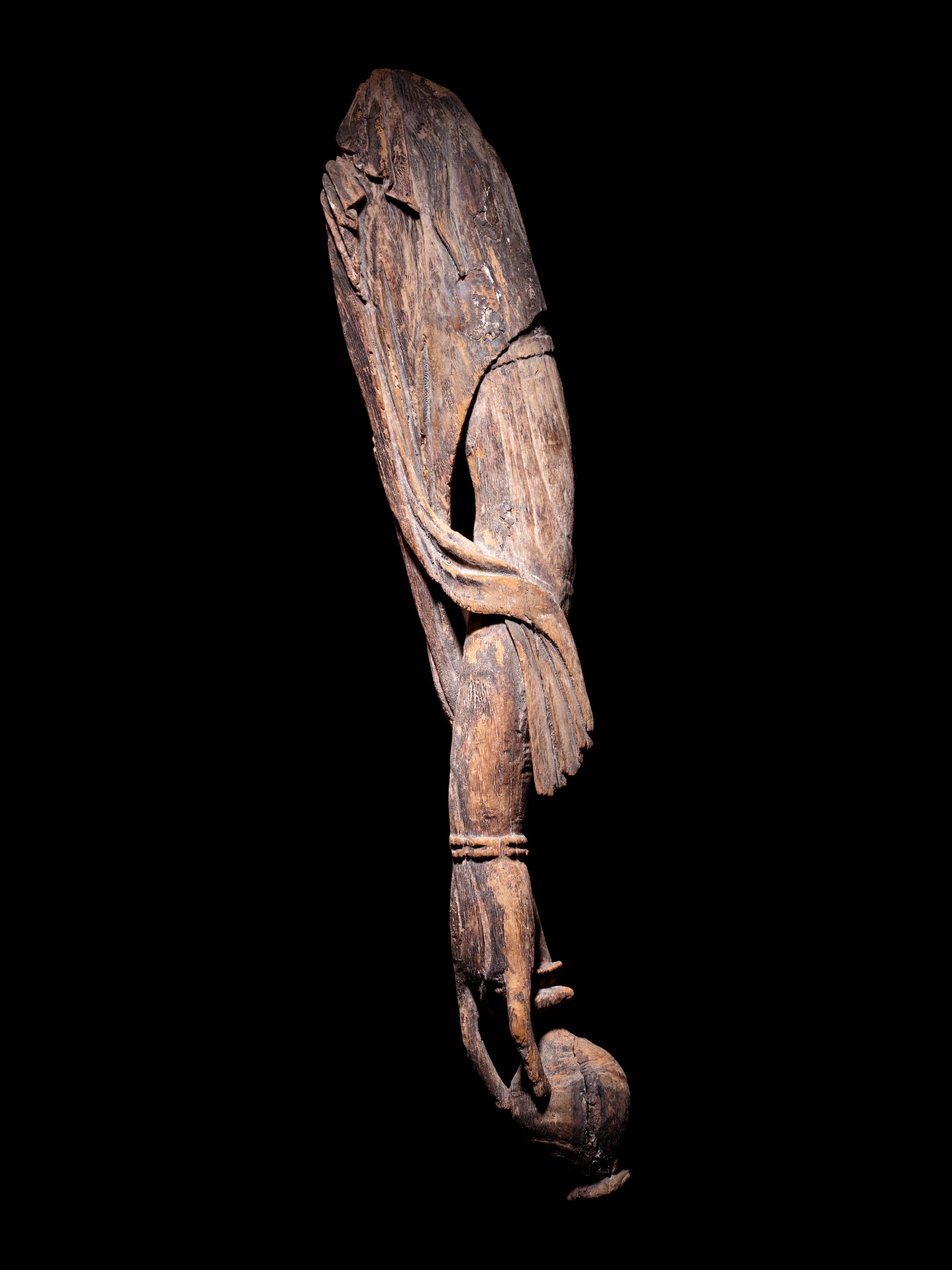 A Carved Wood Arm of Guanyin