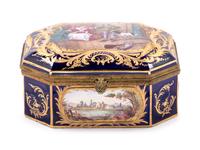A Sèvres Style Gilt Metal Mounted, Painted and Parcel Gilt Porcelain Table Casket