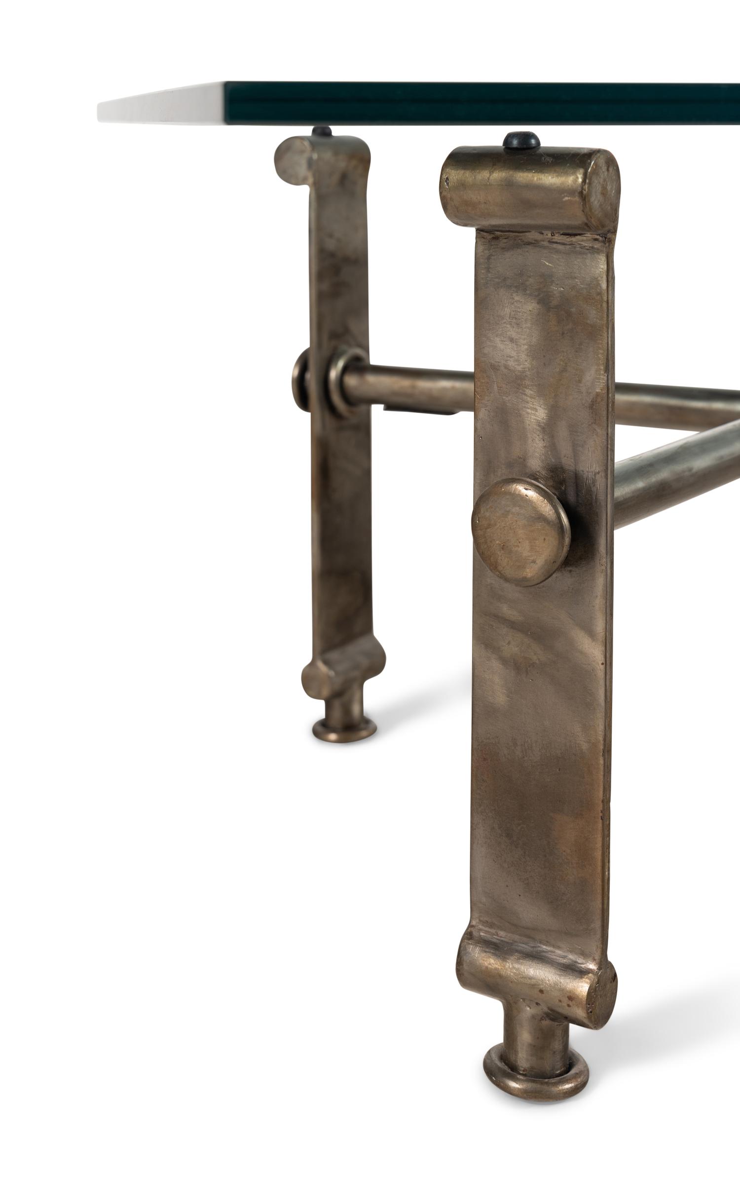 An Ilana Goor Bronze and Glass Coffee Table