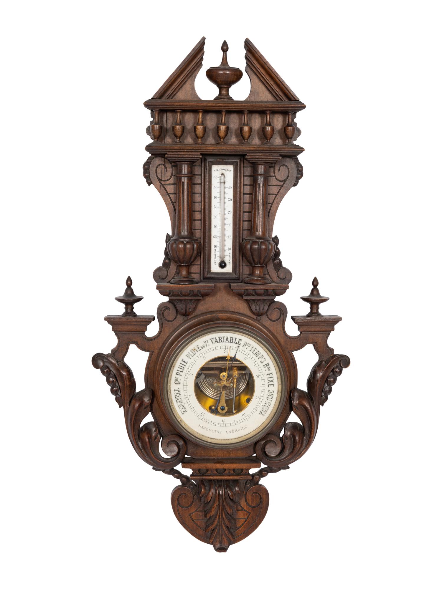 A French Carved Walnut Wheel Barometer