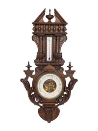 A French Carved Walnut Wheel Barometer