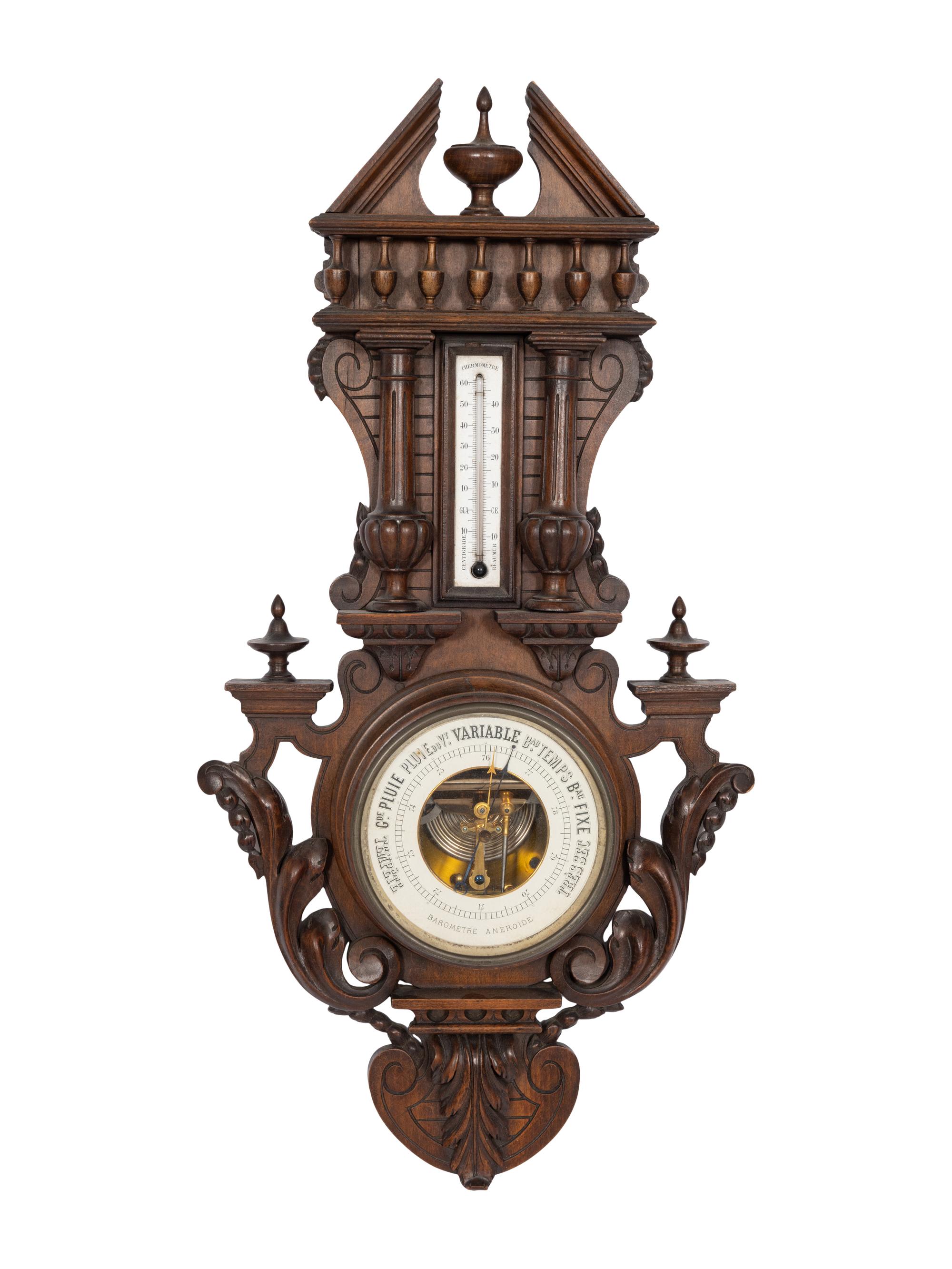 A French Carved Walnut Wheel Barometer