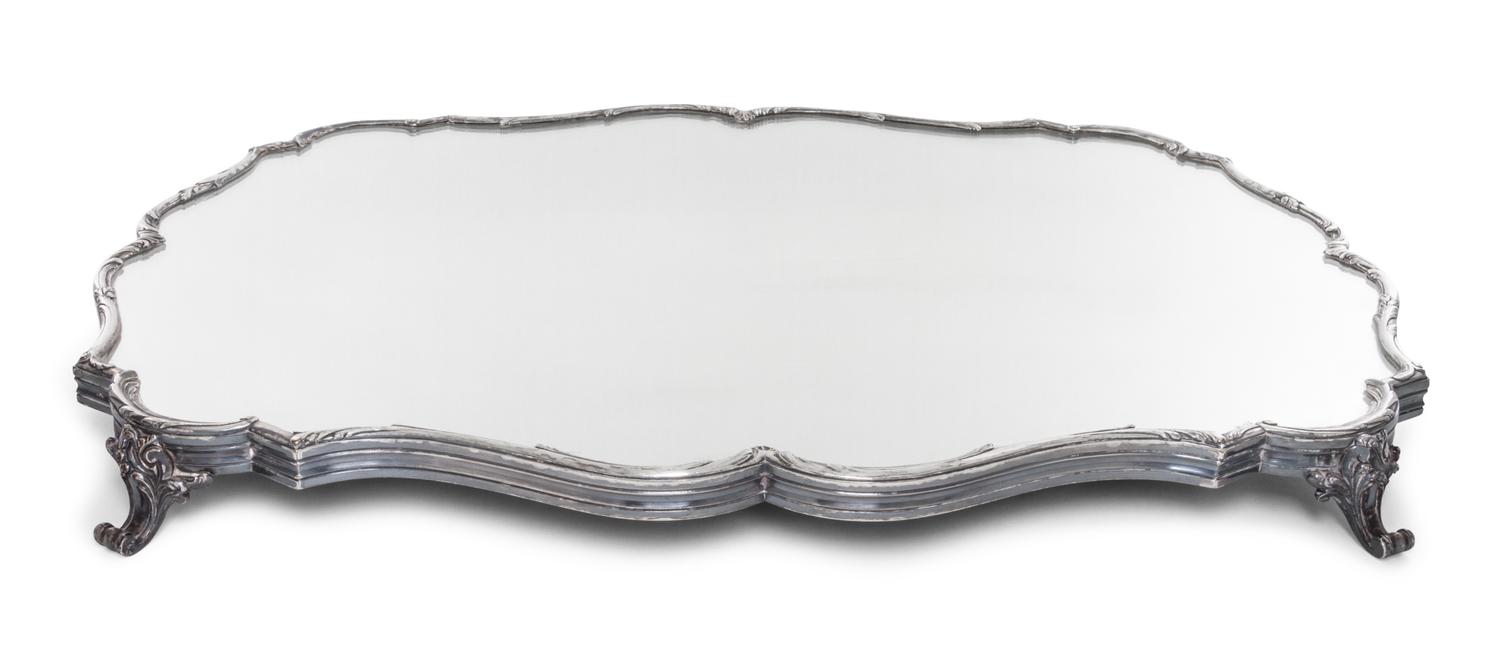 A French Silver-Plate Table Plateau, Bointaburet, Paris, 20th Century, of shaped rectangular form raised on four scroll feet.