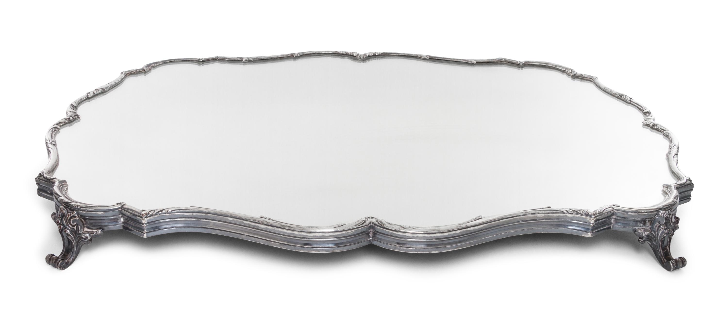 A French Silver-Plate Table Plateau, Bointaburet, Paris, 20th Century, of shaped rectangular form raised on four scroll feet.