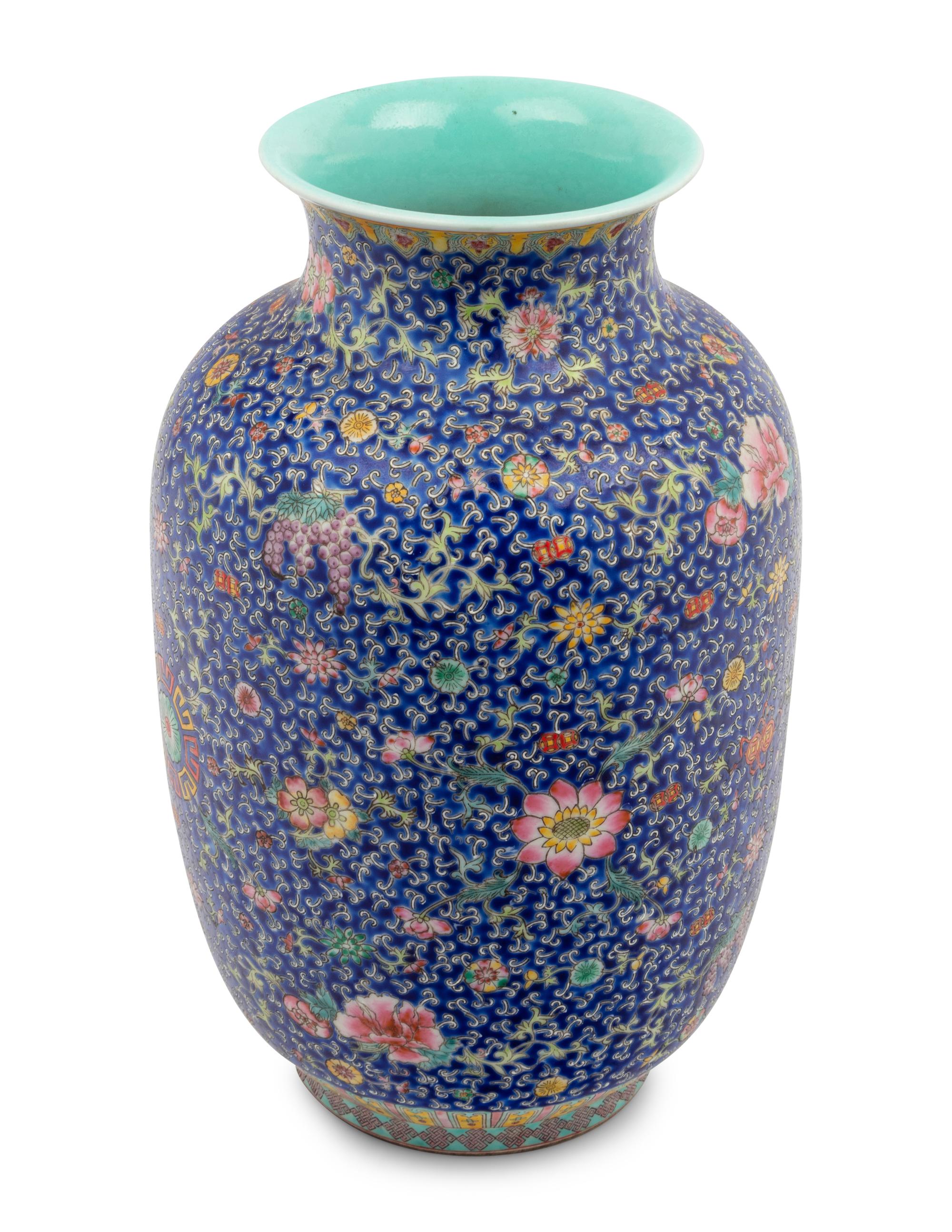 A Chinese Blue Ground Famille Rose Porcelain Baluster Vase