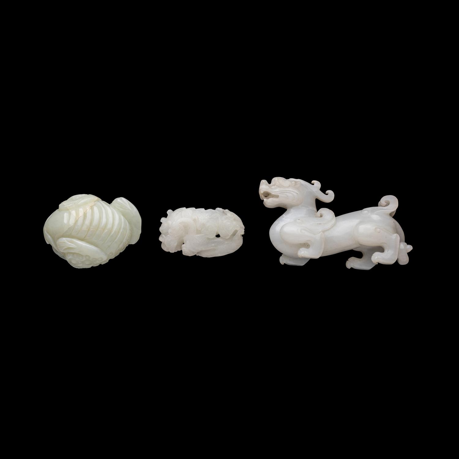 Three Chinese White Jade 'Mythical Beast' Jade Carvings, 20th Century 近代 白玉靈獸把件三枚