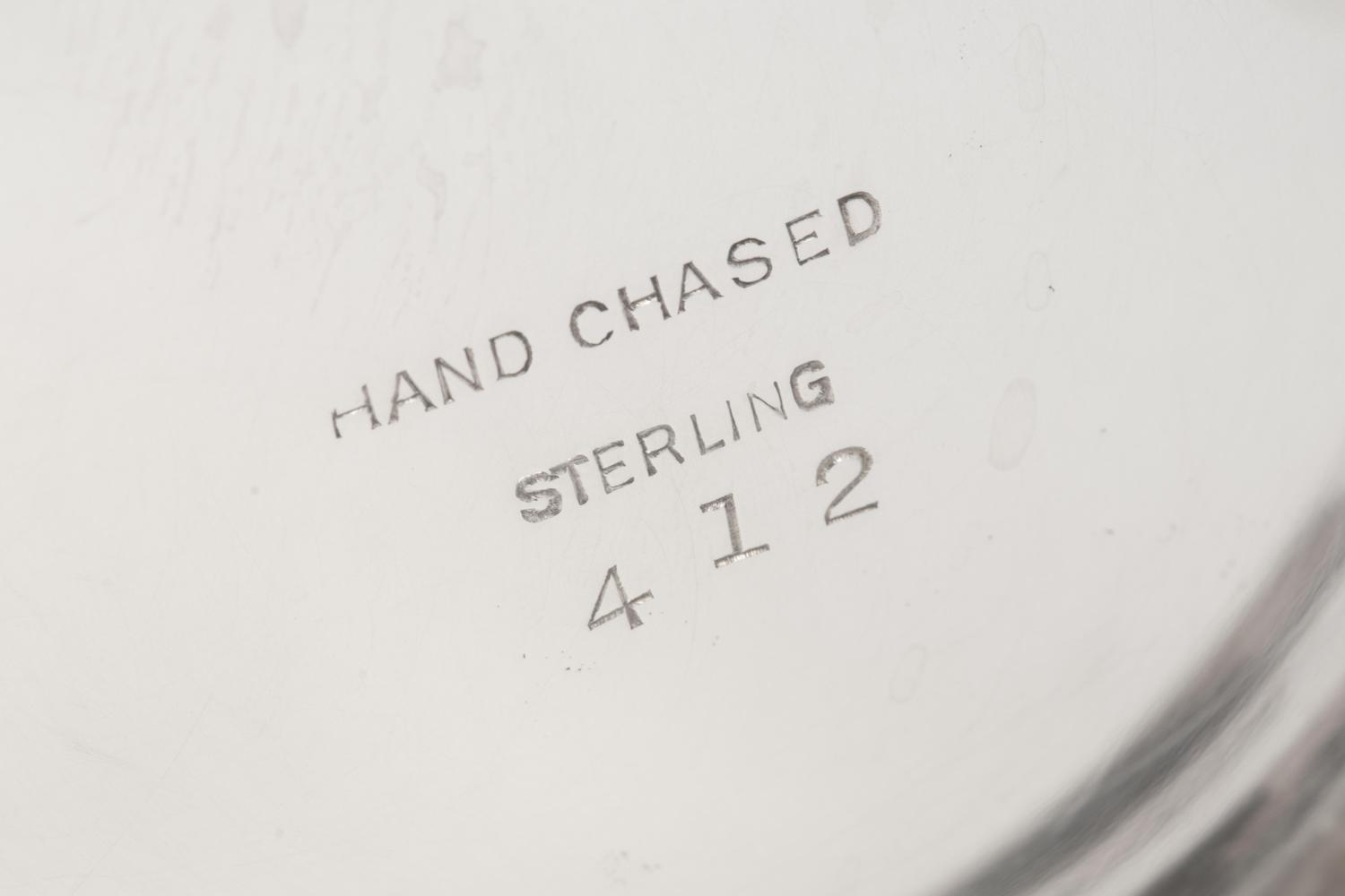 An American Silver 'Hand Chased' Seven-Piece Tea and Coffee Service