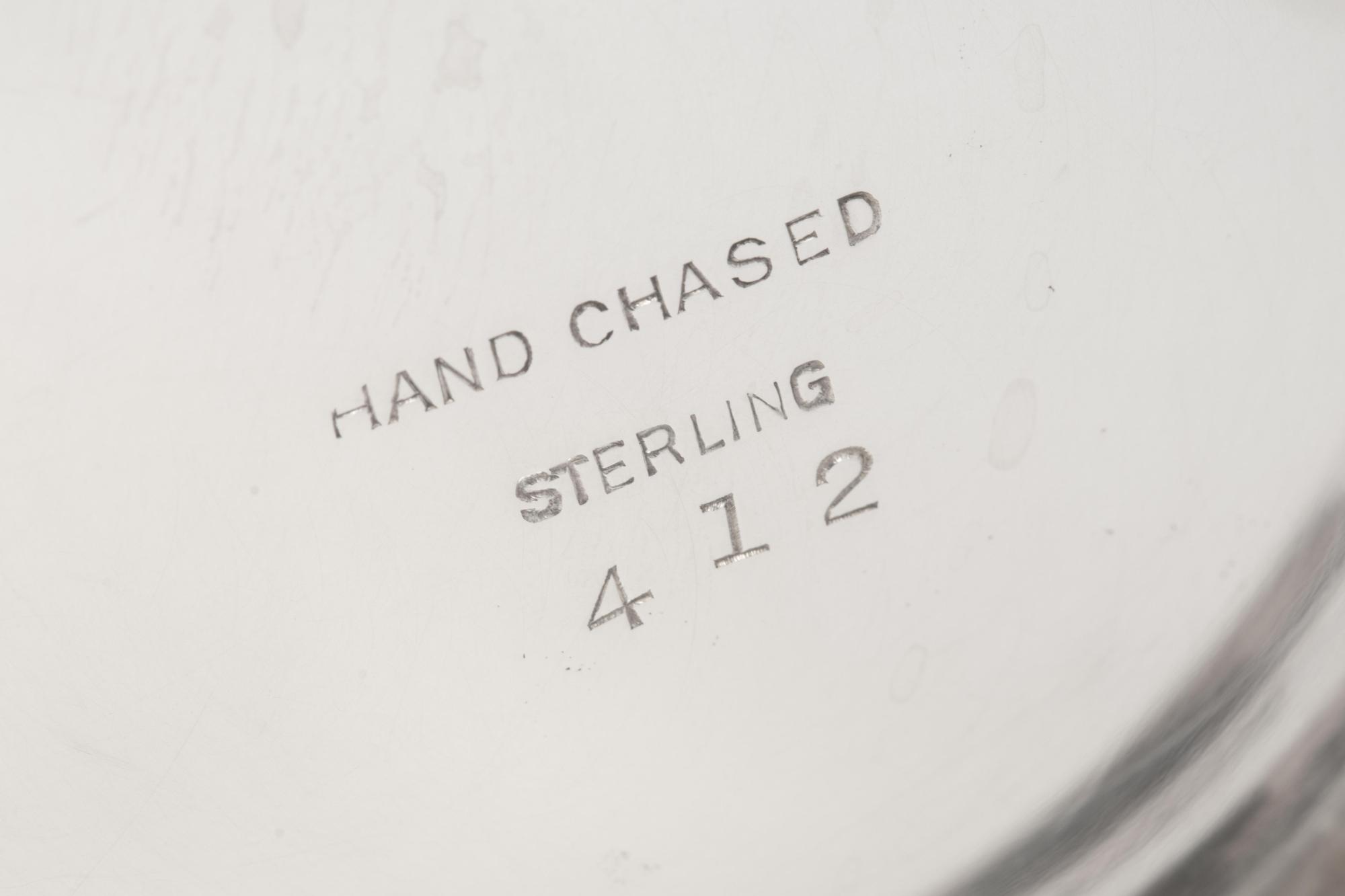An American Silver 'Hand Chased' Seven-Piece Tea and Coffee Service