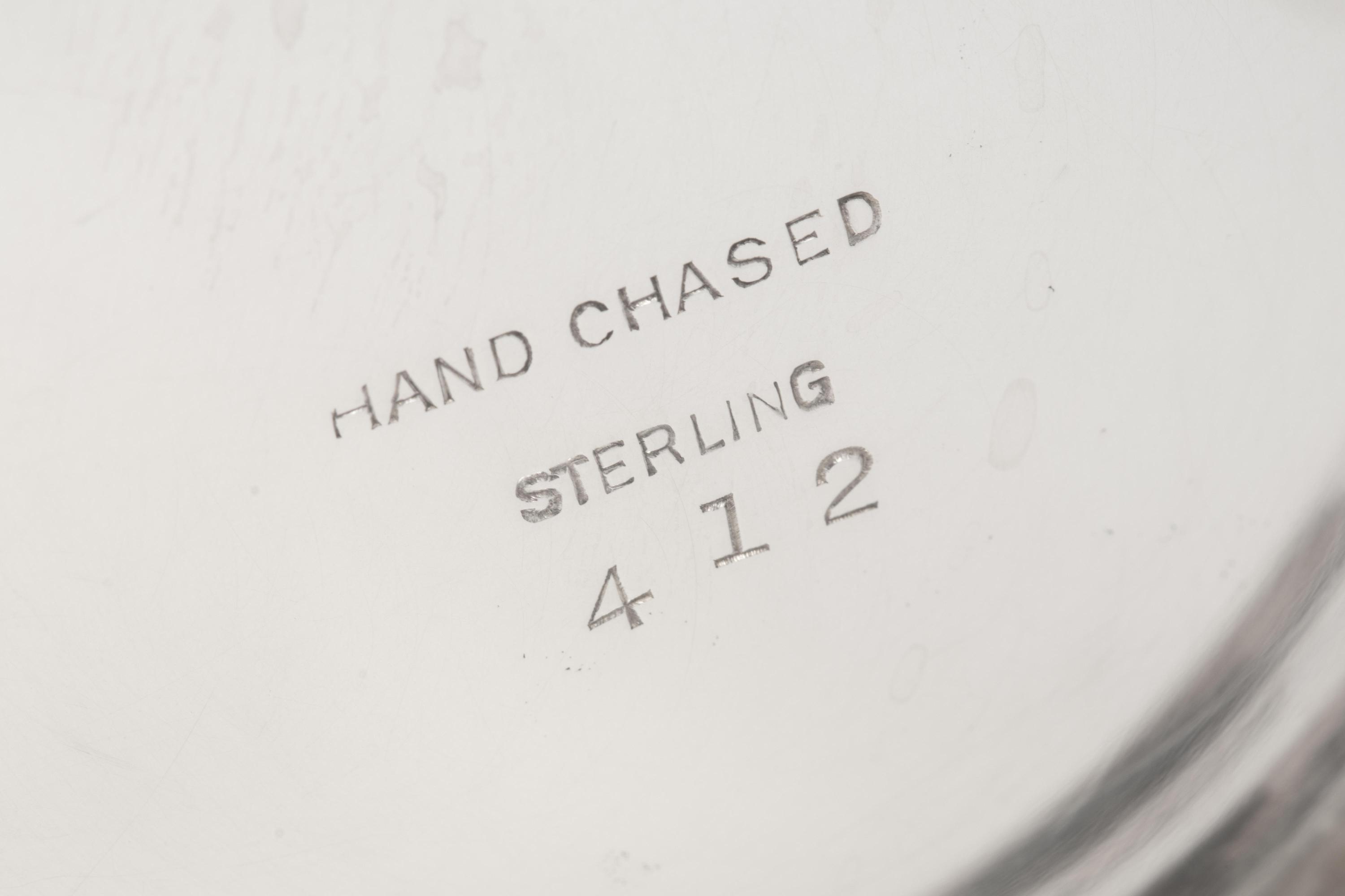 An American Silver 'Hand Chased' Seven-Piece Tea and Coffee Service