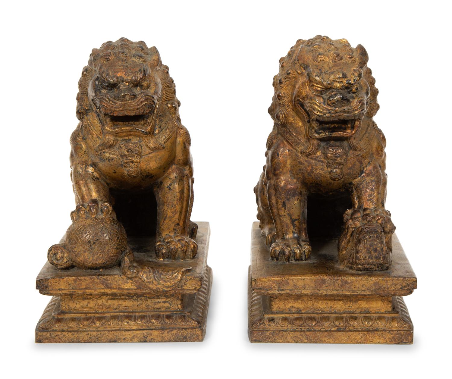 A Pair of Gilt Bronze Fu Lions