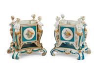 A Pair of German Porcelain Figural Jardinières